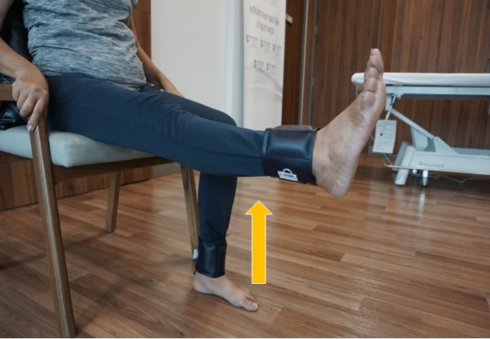 Leg kicking with sandbag