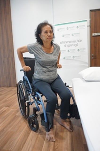 From wheelchair to bed  
